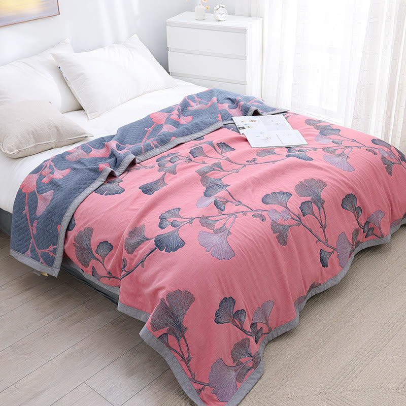 Reversible cotton gauze blanket with ginkgo leaf pattern and border, breathable for summer and transitional seasons