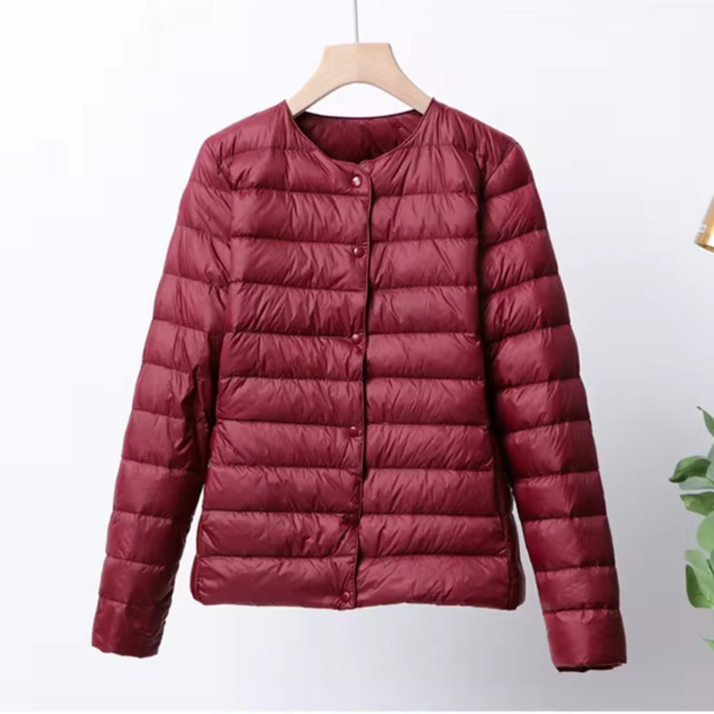 Lightweight women's down jacket with short cut