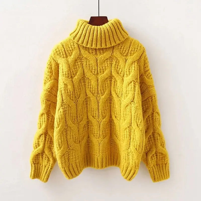 Women's knit pullover with high collar and loose fit