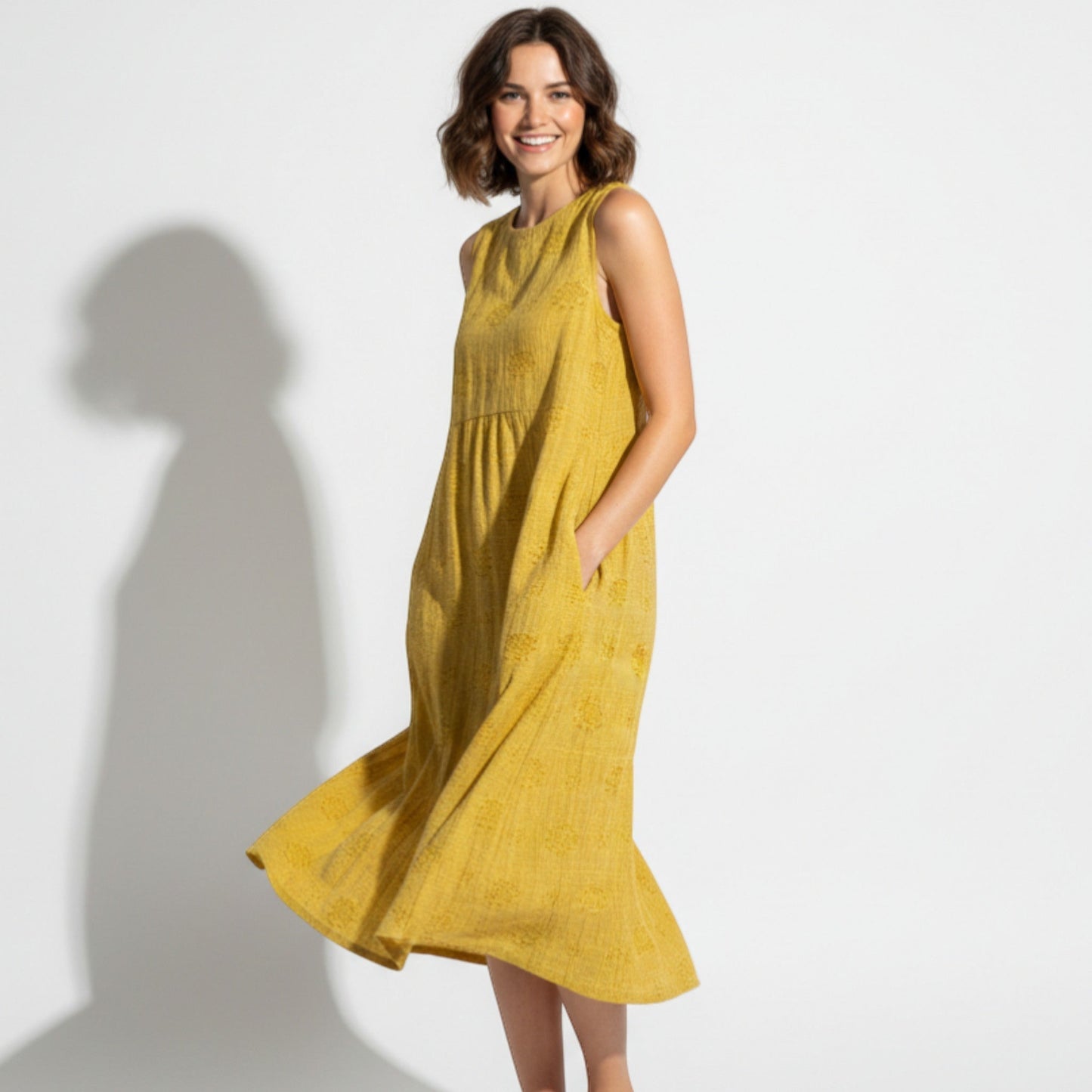 Women's Sleeveless Midi Dress with Tonal Floral Embroidery Loose Empire Cut with Side Pockets made of Blended Fabric