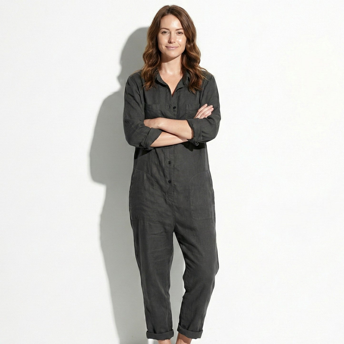 Women's jumpsuit with long sleeves and button placket