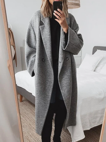 Women's long coat with classic cut and button closure