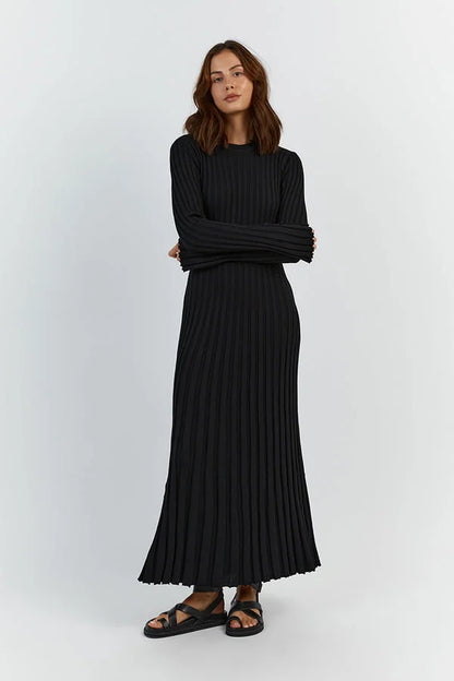 Floor-length women's maxi dress with vertical lines and slim silhouette