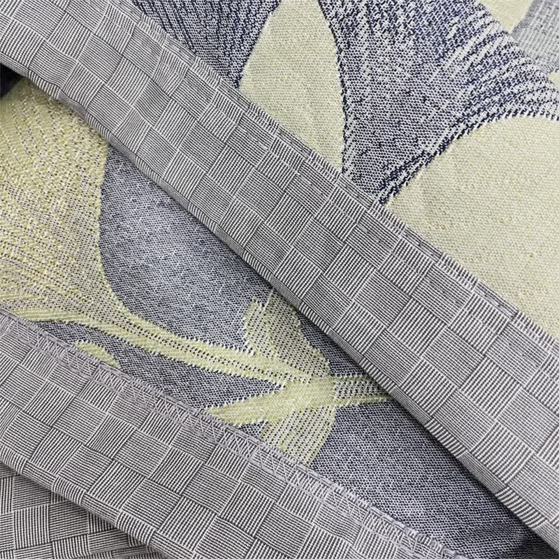 Reversible cotton gauze blanket with ginkgo leaf pattern and border, breathable for summer and transitional seasons