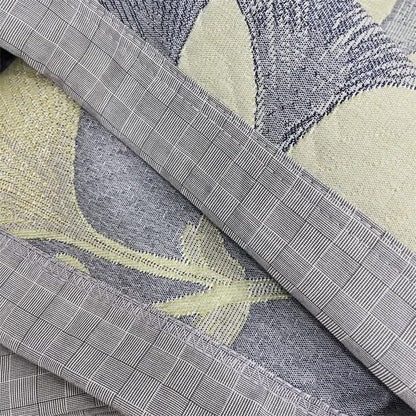 Reversible cotton gauze blanket with ginkgo leaf pattern and border, breathable for summer and transitional seasons