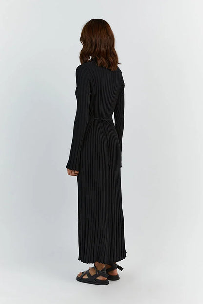 Floor-length women's maxi dress with vertical lines and slim silhouette