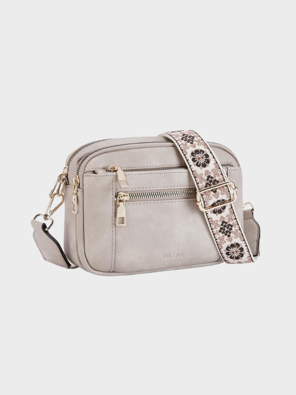 Women's leather shoulder bag with main compartment and adjustable strap