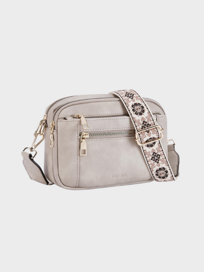 Women's leather shoulder bag with main compartment and adjustable strap