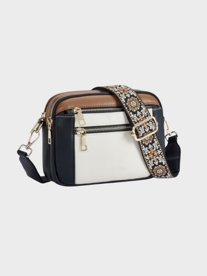 Women's leather shoulder bag with main compartment and adjustable strap