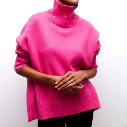 Knitted sweater with high collar and loose fit