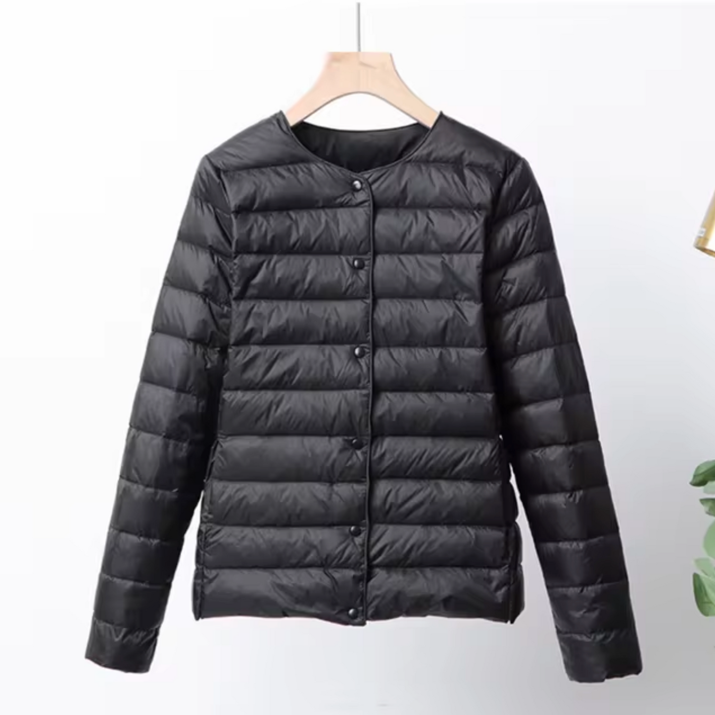 Lightweight women's down jacket with short cut