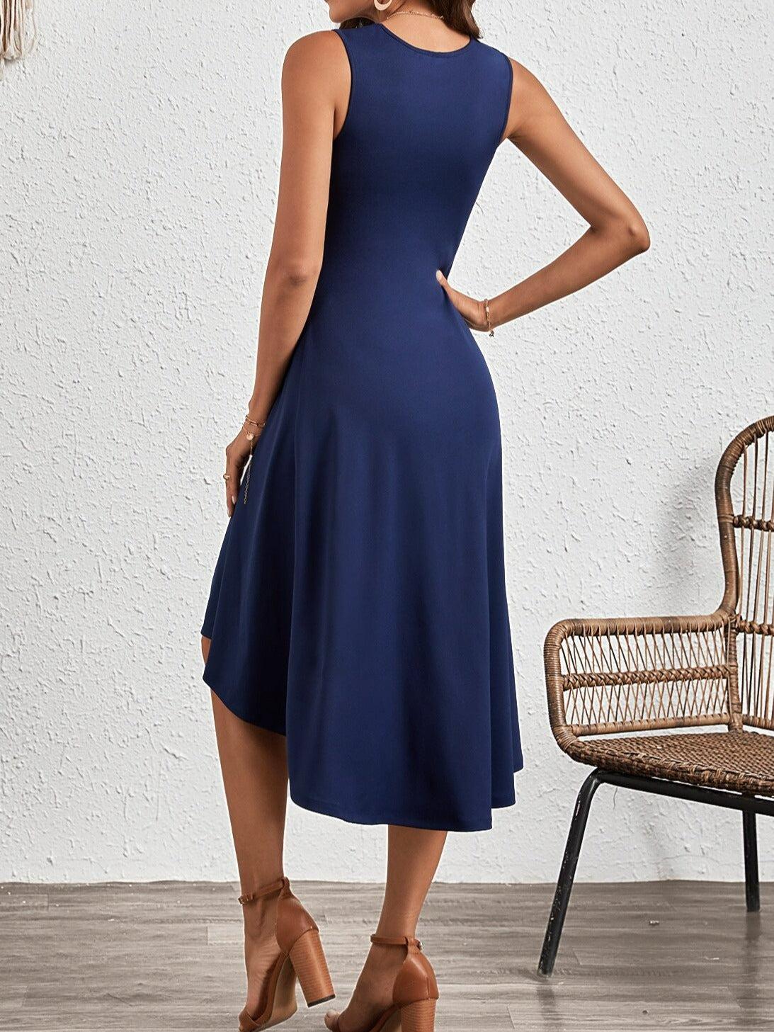 Sleeveless women's dress with round neckline and asymmetrical hem