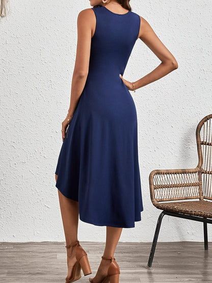 Sleeveless women's dress with round neckline and asymmetrical hem