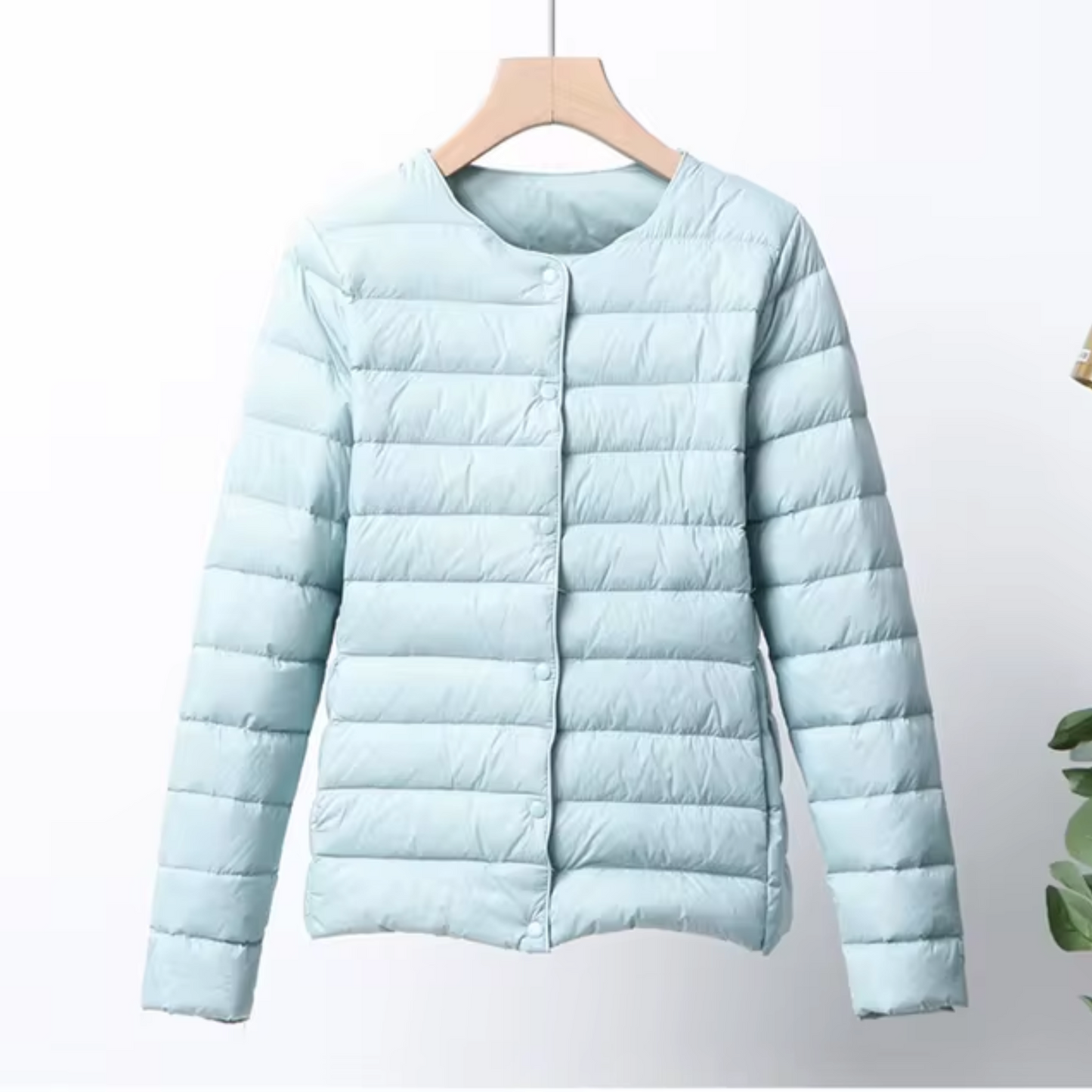 Lightweight women's down jacket with short cut