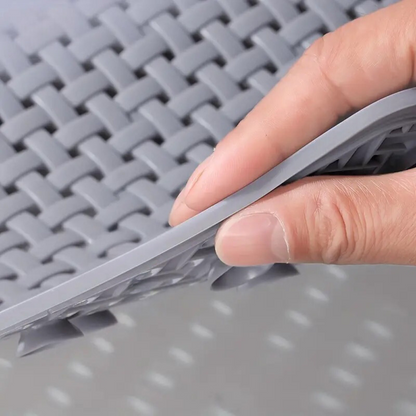 Non-slip mat for shower and bathtub made of silicone with basket weave design, suction cup underside