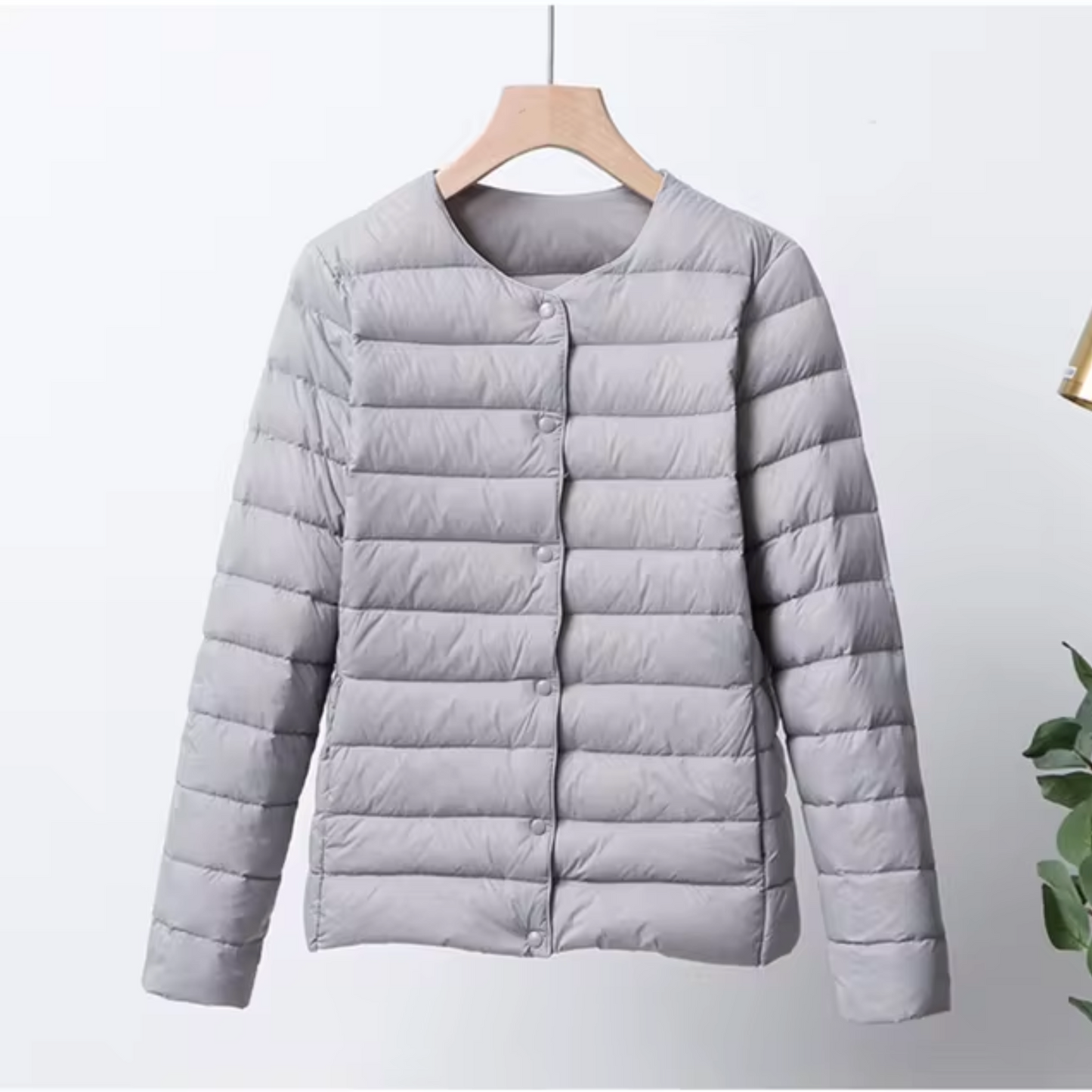Lightweight women's down jacket with short cut