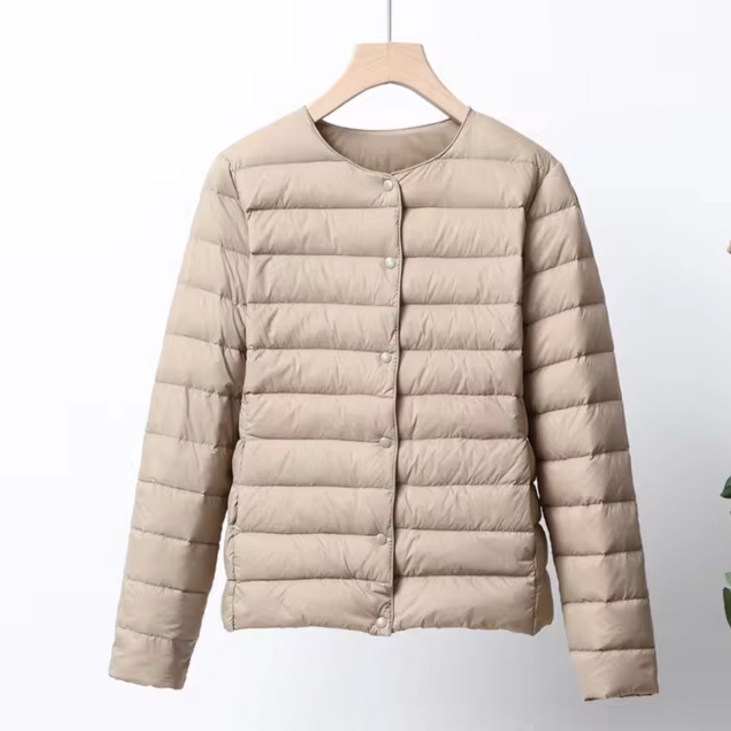 Lightweight women's down jacket with short cut