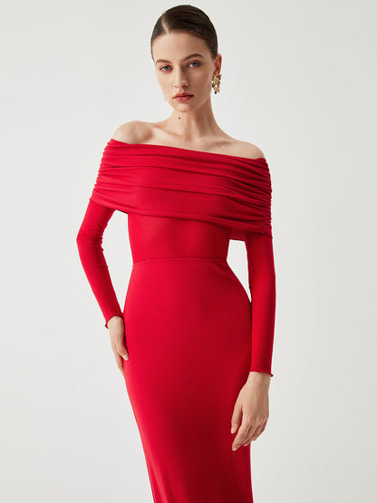 Floor-length women's evening dress with off-the-shoulder neckline, long sleeves, and gathered bust