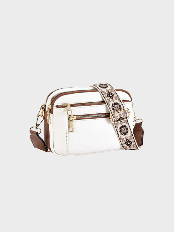 Women's leather shoulder bag with main compartment and adjustable strap