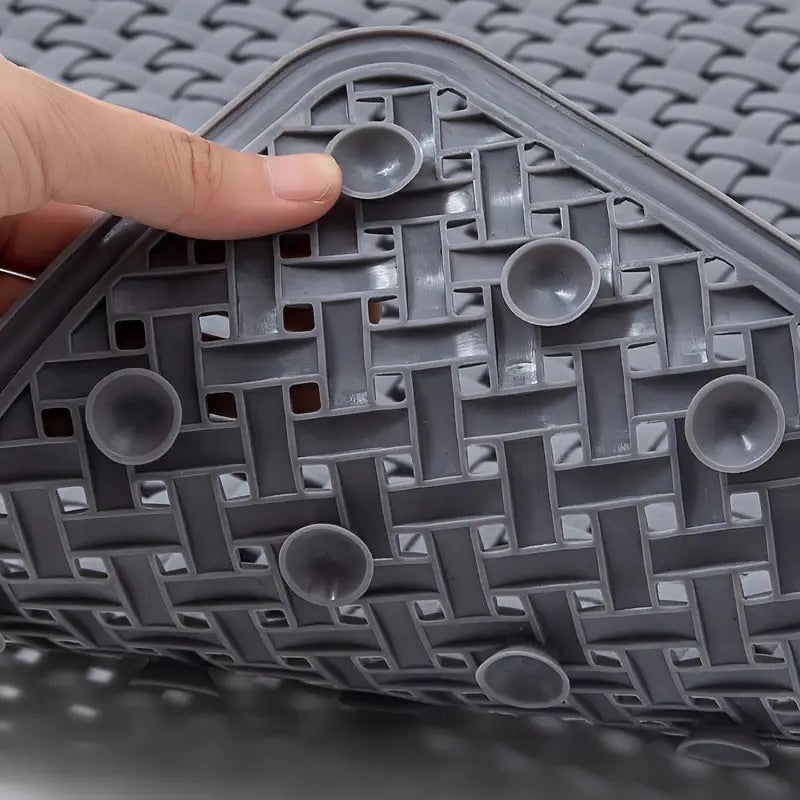 Non-slip mat for shower and bathtub made of silicone with basket weave design, suction cup underside