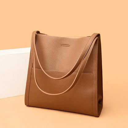 Women's leather handbag with multiple compartments