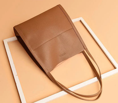 Women's leather handbag with multiple compartments