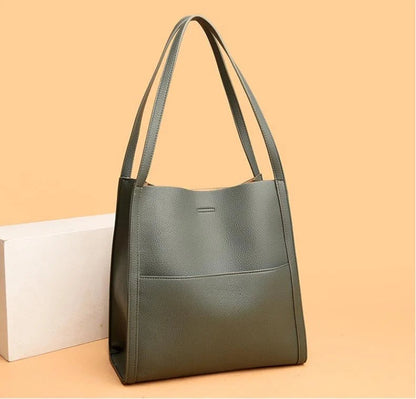Women's leather handbag with multiple compartments