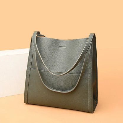 Women's leather handbag with multiple compartments
