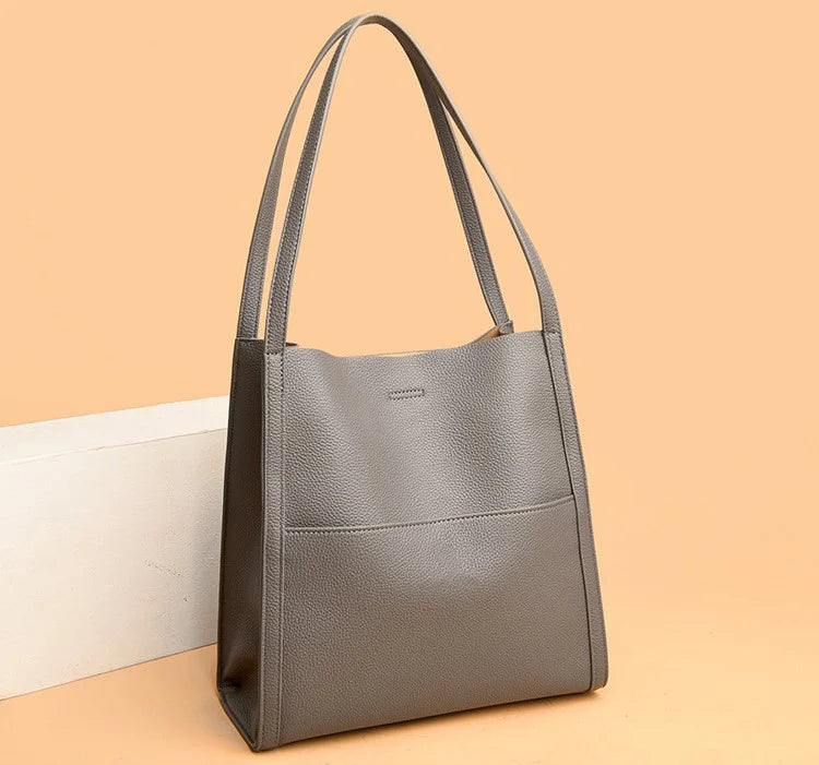 Women's leather handbag with multiple compartments