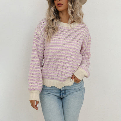 Women's knit pullover made of cotton blend with striped pattern and button placket at the back
