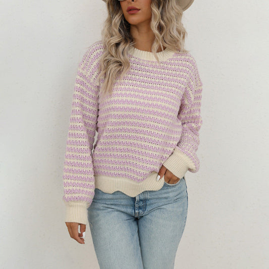 Women's knit pullover made of cotton blend with striped pattern and button placket at the back