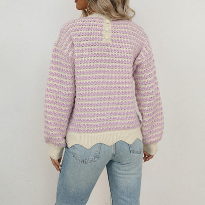Women's knit pullover made of cotton blend with striped pattern and button placket at the back