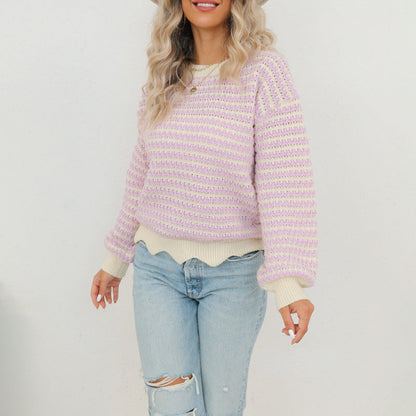 Women's knit pullover made of cotton blend with striped pattern and button placket at the back