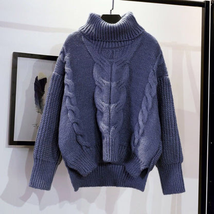 Women's knit pullover with high collar and loose fit