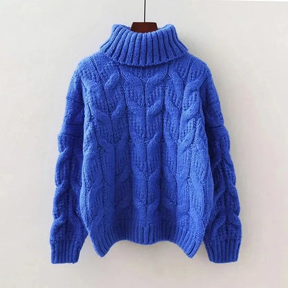 Women's knit pullover with high collar and loose fit