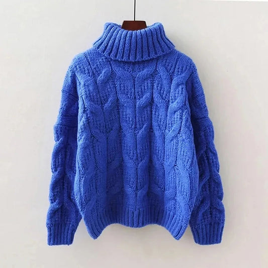 Women's knit pullover with high collar and loose fit