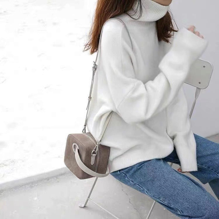 Turtleneck pullover with loose fit made of wool and acrylic
