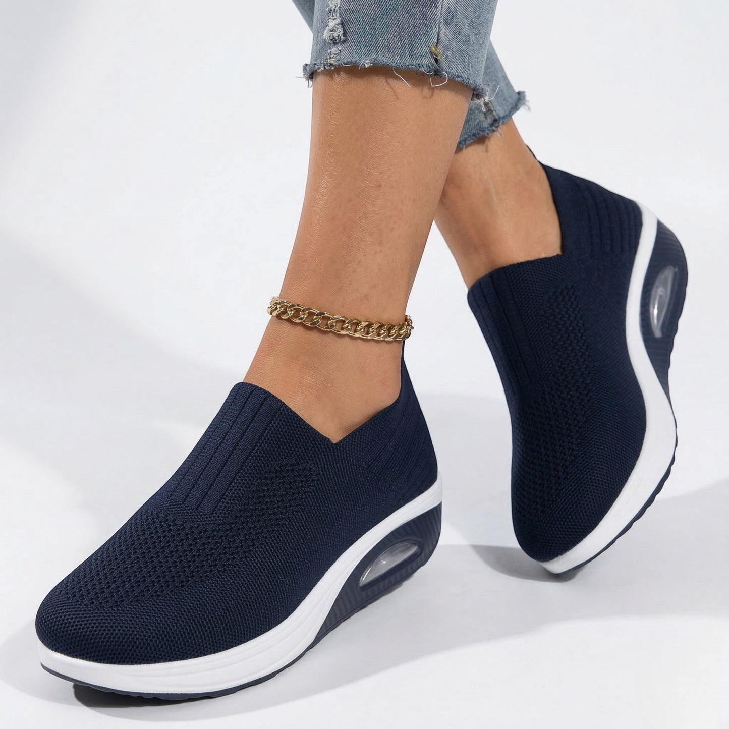 Women's sneakers with mesh upper and wedge sole