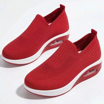 Women's sneakers with mesh upper and wedge sole