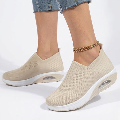Women's sneakers with mesh upper and wedge sole