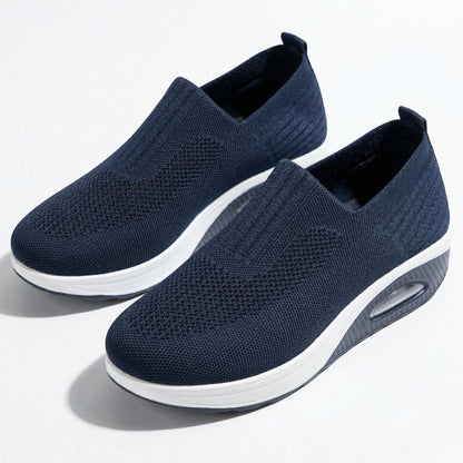 Women's sneakers with mesh upper and wedge sole
