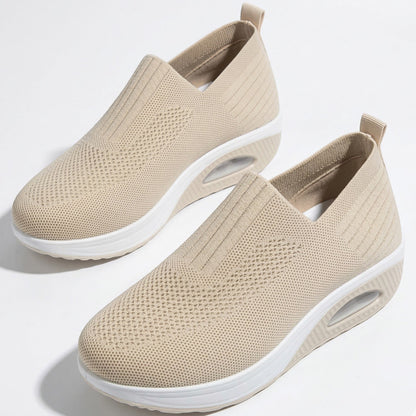 Women's sneakers with mesh upper and wedge sole