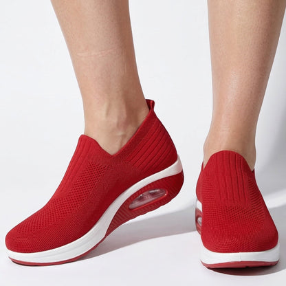 Women's sneakers with mesh upper and wedge sole