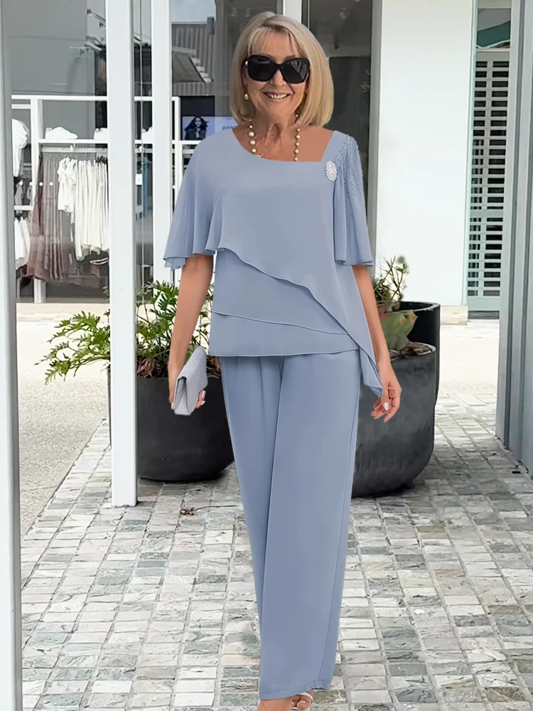 Women's Two-Piece Festive Set with Asymmetric Chiffon Top and Straight Pants Brooch Detail