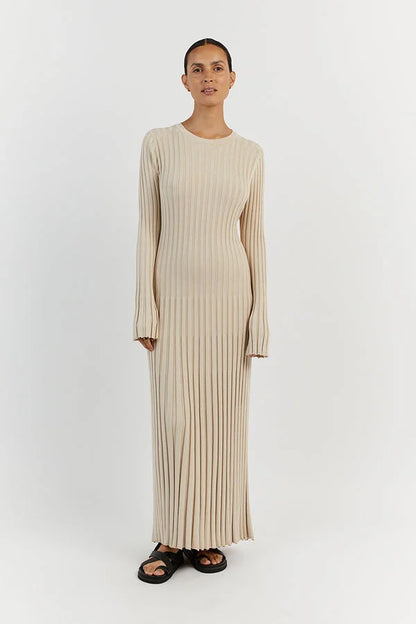 Floor-length women's maxi dress with vertical lines and slim silhouette