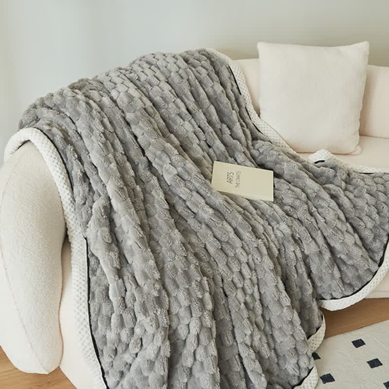 Reversible coral fleece blanket with 3D popcorn texture and contrast trim, extra thick and soft for sofa and bed