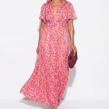Women's maxi dress with V-neck, floral pattern, and flutter sleeves
