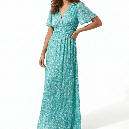 Women's maxi dress with V-neck, floral pattern, and flutter sleeves