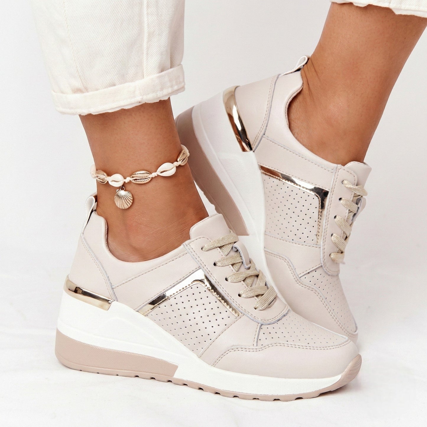 Women's sneakers with wedge heel and metallic accents