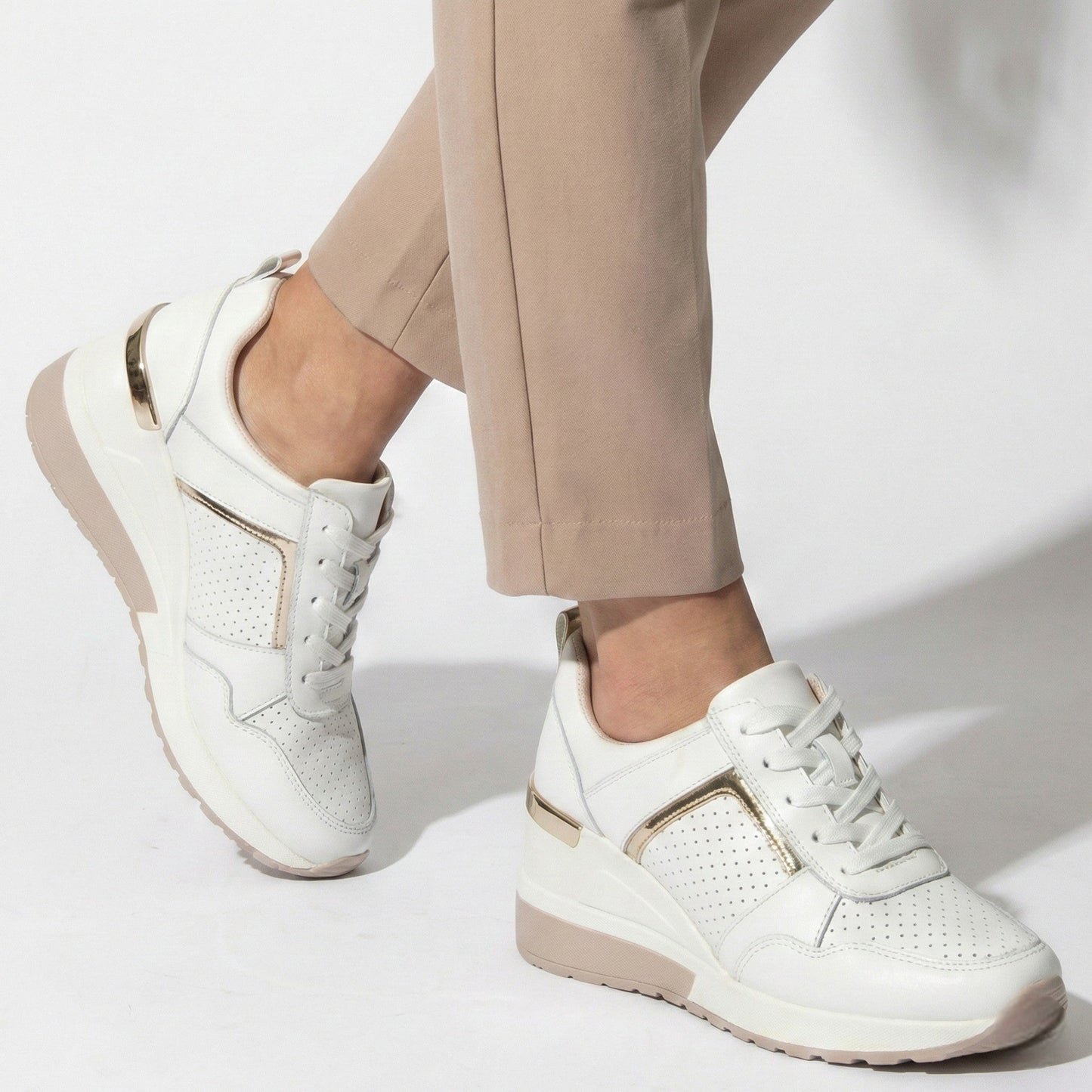 Women's sneakers with wedge heel and metallic accents